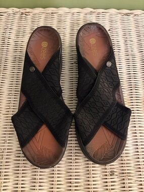 Bzees Black Crisscross Slip-On Sandals with Brown Footbed